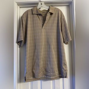 PGA Tour Short Sleeve Polo Golf Shirt is a Size Large.